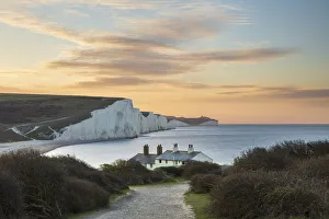 Seven Sisters and Beachy Head with coastguard cottages at sunrise in spring, Seaford Head Seven Sisters and Beachy Head with coastguard cottages at sunrise in spring, Seaford Head