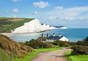 The Seven Sisters chalk cliffs and coastguard cottages, South Downs Way, South Downs National Park, East Sussex