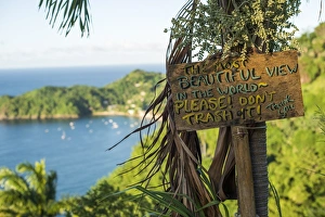 A sign asking readers not to trash the most beautiful view in the world at Castara Bay in A sign asking readers not to trash the most beautiful view in the world at Castara Bay in
