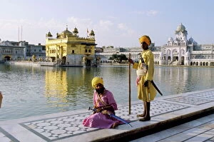 Indian Architecture Collection: Sikhs in front of the Sikhs Golden Temple