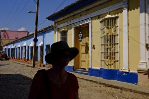 The silhouette of a woman on a quiet street, Trinidad, Sancti Spiritus, Cuba, West Indies The silhouette of a woman on a quiet street, Trinidad, Sancti Spiritus, Cuba, West Indies