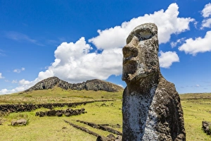 Single moai statue guards the entrance at the 15 moai restored ceremonial site of Ahu Tongariki on Easter Island Single moai statue guards the entrance at the 15 moai restored ceremonial site of Ahu Tongariki on Easter Island