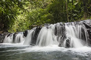 Slow motion blur of waterfall in Corcovado National Park, Osa Peninsula, Costa Rica Slow motion blur of waterfall in Corcovado National Park, Osa Peninsula, Costa Rica