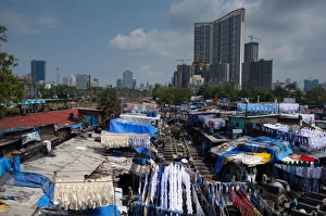 Slum washing ghats surrounded by expensive residential developments, Mumbai (Bombay) Slum washing ghats surrounded by expensive residential developments, Mumbai (Bombay)