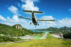 Landing Collection: Small airplane landing at the airport of St. Barth (Saint Barthelemy), Lesser Antilles