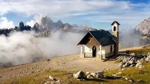 Small church with the Cadini di Misurina mountain range in the background, Dolomites Small church with the Cadini di Misurina mountain range in the background, Dolomites
