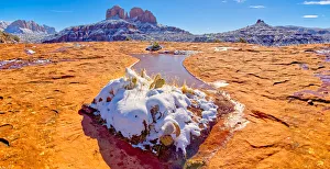 Snow covered Cathedral Rock in Sedona viewed from a sandstone plateau along Secret Slick Snow covered Cathedral Rock in Sedona viewed from a sandstone plateau along Secret Slick
