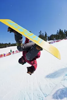 Winter Sports Gallery: A snowboarder jumping at Telus Half Pipe competition 2009