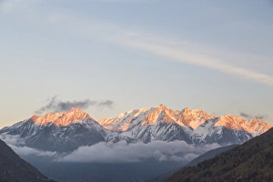 Snowy peaks at sunset, Ponte Di Legno, Brescia province, Valcamonica, Lombardy, Italy Snowy peaks at sunset, Ponte Di Legno, Brescia province, Valcamonica, Lombardy, Italy