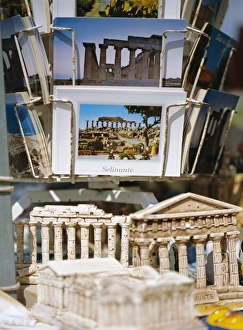 Souvenirs including models of temples and postcards for sale Souvenirs including models of temples and postcards for sale
