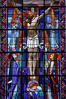 Stained glass of the Crucifixion in Notre Dame du Rosaire Catholic church, Saint-Ouen Stained glass of the Crucifixion in Notre Dame du Rosaire Catholic church, Saint-Ouen