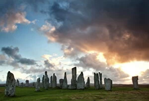 Antiquities Gallery: Standing Stones of Callanish at sunset with dramatic sky in the background, near Carloway