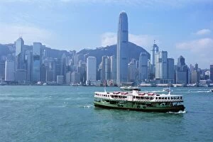 Commuter Gallery: Star Ferry crossing Victoria Harbour towards Hong Kong Island, with Central skyline beyond