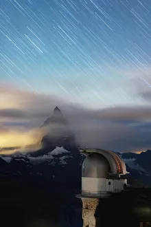 Star trail in the night sky on Matterhorn from observatory tower of Kulmhotel Gornergrat Star trail in the night sky on Matterhorn from observatory tower of Kulmhotel Gornergrat