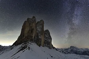 Stars in the night sky over the majestic rocks of Tre Cime di Lavaredo, Sesto Dolomites Stars in the night sky over the majestic rocks of Tre Cime di Lavaredo, Sesto Dolomites