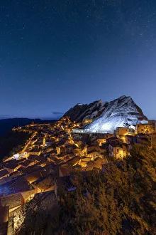 Stars in the night sky over the medieval town of Pietrapertosa, Dolomiti Lucane Stars in the night sky over the medieval town of Pietrapertosa, Dolomiti Lucane