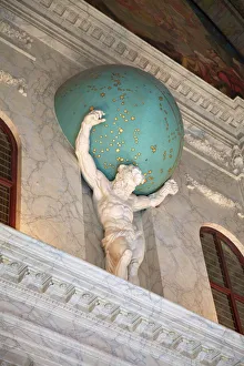 Palace Gallery: Statue of Atlas holding the Universe on his shoulders in the Royal Palace, Amsterdam, Netherlands