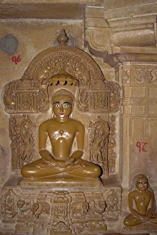 Statue in interior of Jain Temple in the old city Statue in interior of Jain Temple in the old city