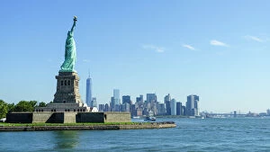 Related Images Gallery: Statue of Liberty and Liberty Island with Manhattan skyline in view, New York City, New York