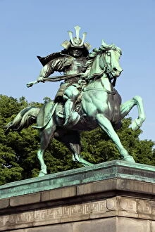 Statue of Samurai warrior Masashige Kusunoki on horseback in Hibiya Park in downtown Tokyo