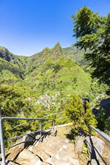Steep steps on mountain path to the green alpine valley and village of Serra de Agua Steep steps on mountain path to the green alpine valley and village of Serra de Agua