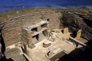One of eight stone houses with stone furniture including beds One of eight stone houses with stone furniture including beds