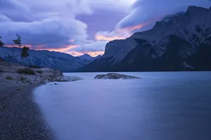 Storm over Mount Inglismaldie and Lake Minnewanka at sunrise, Banff National Park Storm over Mount Inglismaldie and Lake Minnewanka at sunrise, Banff National Park
