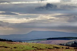 Stormy sky over Pendle Hill from above Settle, North Yorkshire, Yorkshire, England, United Kingdom, Europe Stormy sky over Pendle Hill from above Settle, North Yorkshire, Yorkshire, England, United Kingdom, Europe