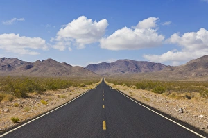 Straight road, Daylight Pass road, Highway 374 from Beatty Nevada, through the Grapevine mountains of the Amargosa Straight road, Daylight Pass road, Highway 374 from Beatty Nevada, through the Grapevine mountains of the Amargosa