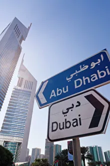 Street sign in front of the Emirates Towers on Sheikh Zayed Road Street sign in front of the Emirates Towers on Sheikh Zayed Road