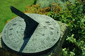 Sundial on plate of slate inscribed Noiseless falls the foot of time that only treads Sundial on plate of slate inscribed Noiseless falls the foot of time that only treads