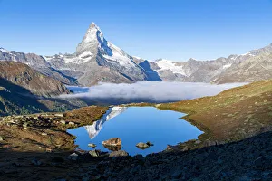 Sunrise over majestic Matterhorn from Stellisee lake, Zermatt, Valais Canton, Swiss Alps Sunrise over majestic Matterhorn from Stellisee lake, Zermatt, Valais Canton, Swiss Alps