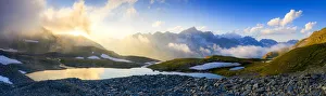 Sunrise over Mittleres Schwarziseeli lake and Galenstock mountain peak in background Sunrise over Mittleres Schwarziseeli lake and Galenstock mountain peak in background