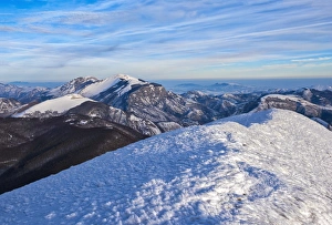 Sunrise on Mountain Catria from the summit of Cucco in winter, Apennines, Umbria Sunrise on Mountain Catria from the summit of Cucco in winter, Apennines, Umbria