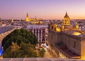 Places Of Worship Gallery: Sunset Seville skyline of Cathedral and city rooftops from the Metropol Parasol, Seville
