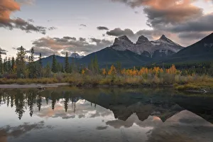 Sunset over Three Sisters in Autumn near Banff National Park, UNESCO World Heritage Site Sunset over Three Sisters in Autumn near Banff National Park, UNESCO World Heritage Site