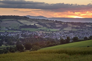 Sunset over Winchcombe and Malvern Hills in distance, Winchcombe, Cotswolds Sunset over Winchcombe and Malvern Hills in distance, Winchcombe, Cotswolds