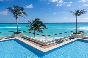 Swimming pool over the turquoise waters of Cancun, Quintana Roo, Mexico, North America Swimming pool over the turquoise waters of Cancun, Quintana Roo, Mexico, North America