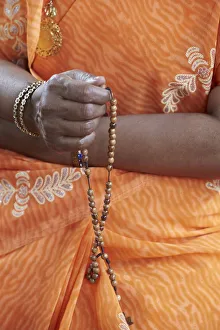 Tamil Catholic woman with rosary, Antony, Hauts-de-Seine, France, Europe Tamil Catholic woman with rosary, Antony, Hauts-de-Seine, France, Europe