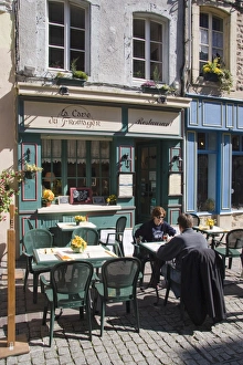 Terrace tables outside the many cafes and restaurants on Rue de Lille in the old quarter Terrace tables outside the many cafes and restaurants on Rue de Lille in the old quarter