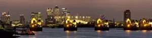 Images Dated 9th September 2014: Thames Flood Barrier with Docklands and Canary Wharf panorama from Woolwich, London