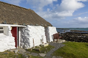 Thatched cottage and hostel, Isle of Berneray, North Uist, Outer Hebrides, Scotland Thatched cottage and hostel, Isle of Berneray, North Uist, Outer Hebrides, Scotland