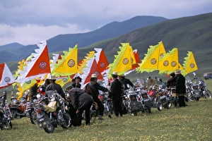 Tibetans using motorbikes instead of horses, festival, Qinghai Province, China, Asia Tibetans using motorbikes instead of horses, festival, Qinghai Province, China, Asia