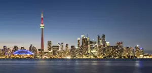 Lake Ontario Gallery: Toronto skyline featuring the CN Tower at night across Lake Ontario, Toronto, Ontario, Canada
