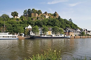 Tour Boats with Castle Ruin in Saarburg on Saar River, Rhineland-Palatinate, Germany Tour Boats with Castle Ruin in Saarburg on Saar River, Rhineland-Palatinate, Germany