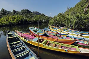 Tourist tour boats on Pute River in karst limestone region, Rammang-Rammang, Maros Tourist tour boats on Pute River in karst limestone region, Rammang-Rammang, Maros