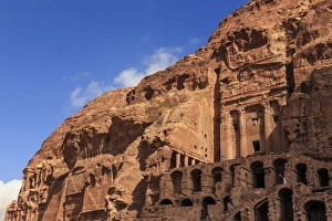 Tourist around the Urn Tomb, Royal Tombs, Petra, UNESCO World Heritage Site, Jordan Tourist around the Urn Tomb, Royal Tombs, Petra, UNESCO World Heritage Site, Jordan