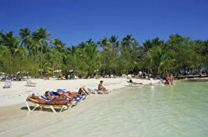 Tourists on beach, Punta Cana, Dominican Republic, West Indies, Caribbean
