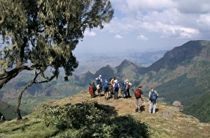 Tourists trekking, Simien Mountains National Park, UNESCO World Heritage Site Tourists trekking, Simien Mountains National Park, UNESCO World Heritage Site