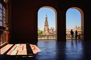Tourists viewing the Plaza de Espana in Parque de Maria Luisa at night, Seville, Andalucia Tourists viewing the Plaza de Espana in Parque de Maria Luisa at night, Seville, Andalucia